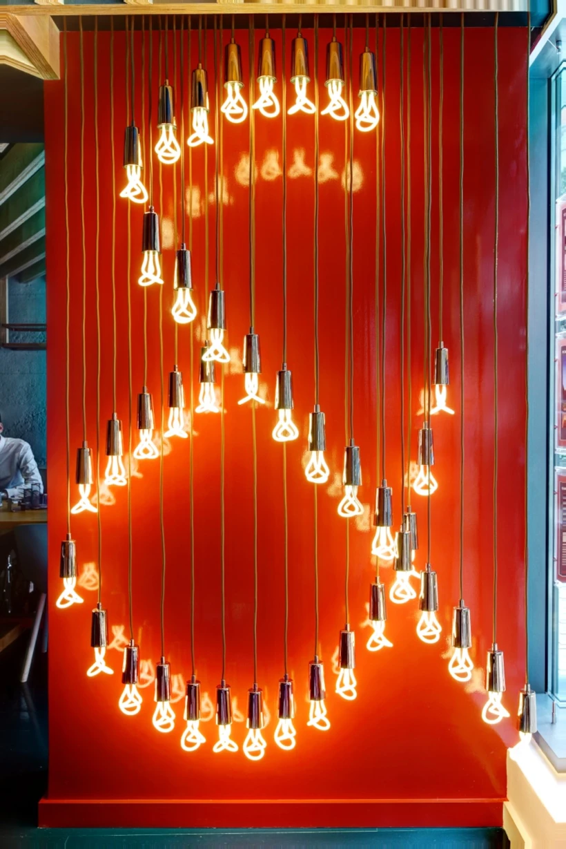 001_Plumen-001-designer-light-bulb-installation-in-real-estate-office-Johns-_amp_-Co