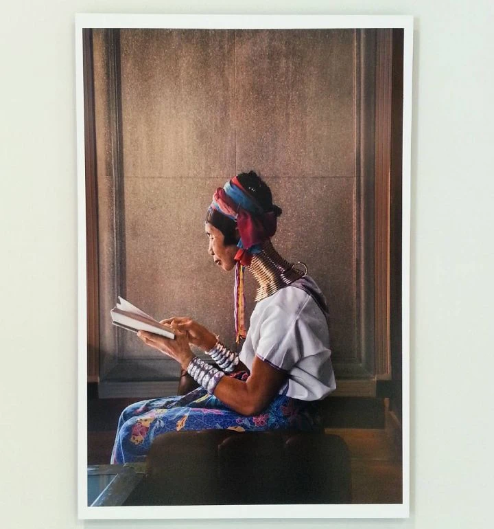 Woman reading by the window