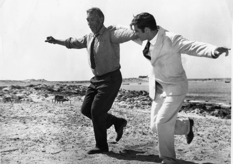 Anthony Quinn (left) and Alan Bates in “Zorba the Greek” (1964).