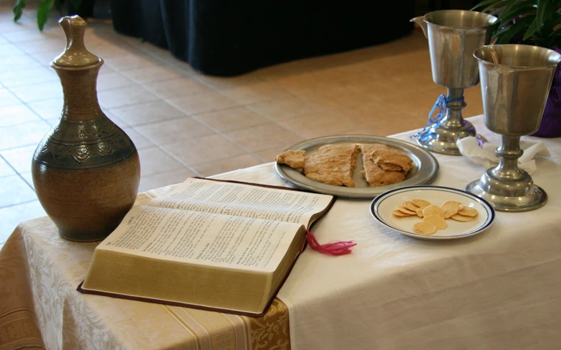 1280px-eucharistelca